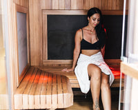 Attractive Woman Sitting in Infrared Sauna